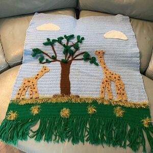 Handmade crocheted nursery wall hanging giraffes